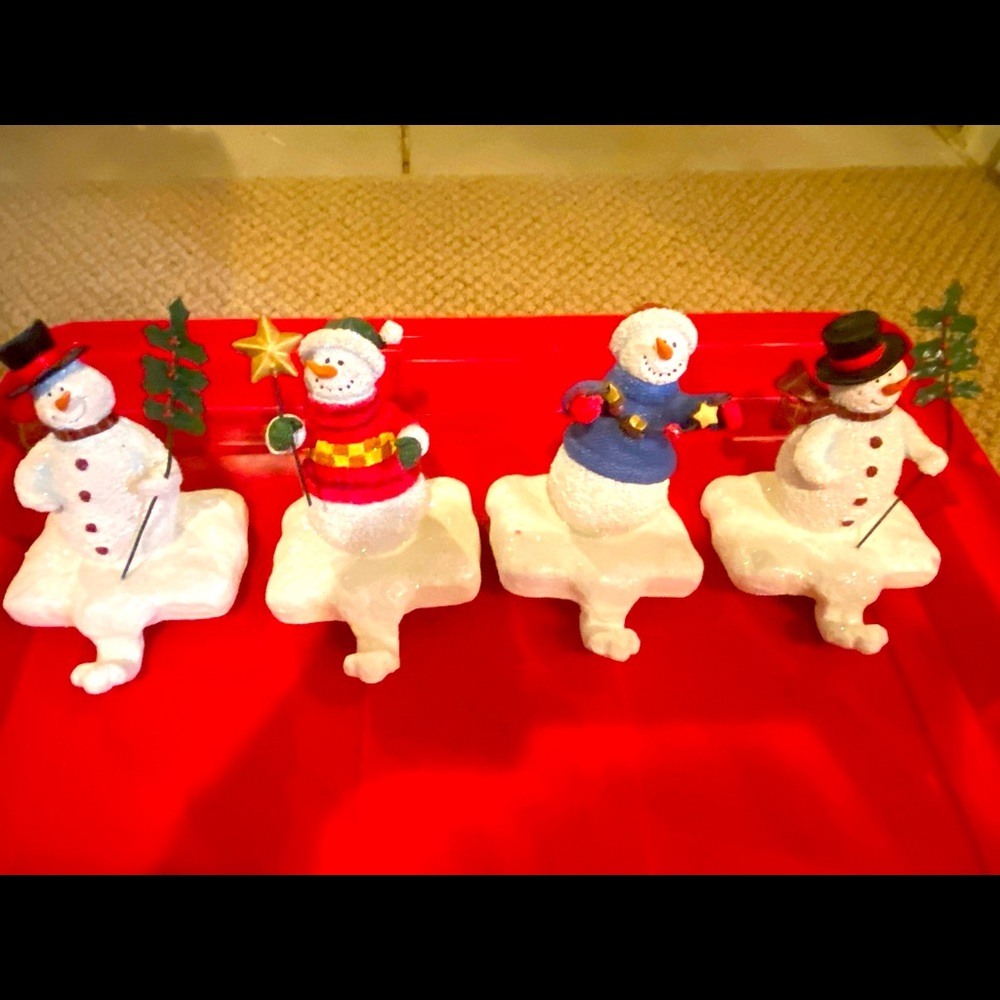 Snowmen Stocking hangers.  Set of 4
